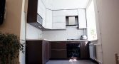 Кухня с отделкой в двухкомнатной квартире